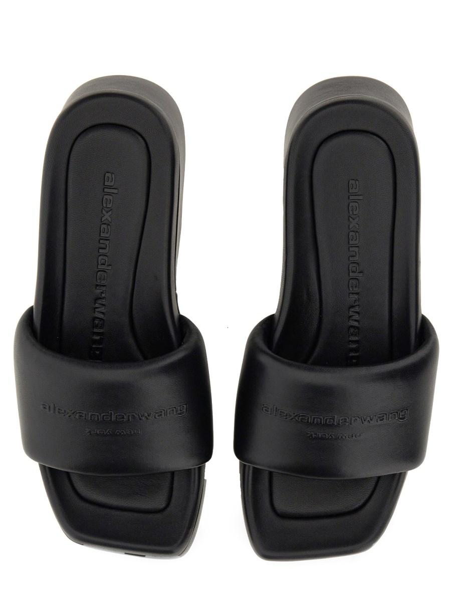 ALEXANDER WANG SANDALO CON LOGO E PLATEAU IN PELLE Bestseller
