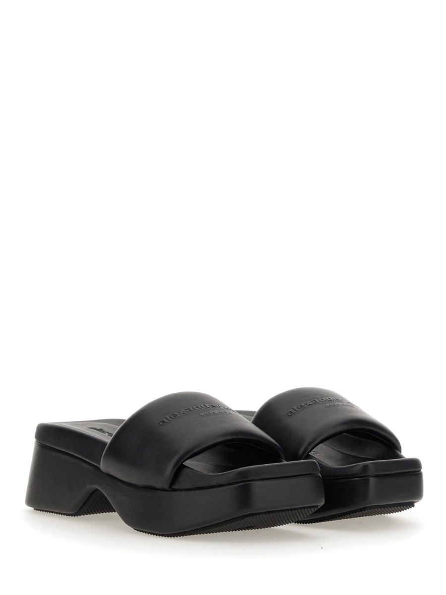 ALEXANDER WANG SANDALO CON LOGO E PLATEAU IN PELLE Bestseller