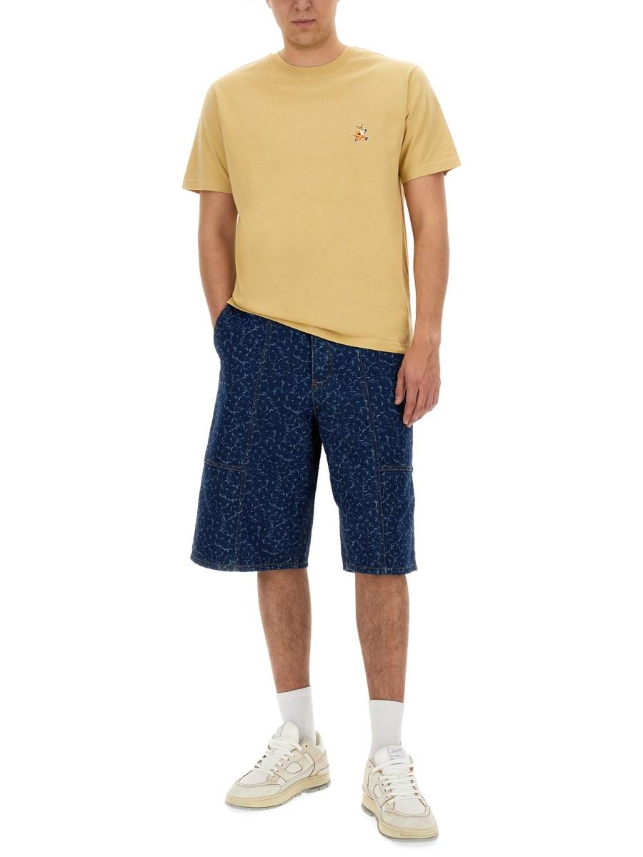 MAISON KITSUNÉ T-SHIRT "SPEEDY FOX" Smaltimento dello stoccaggio