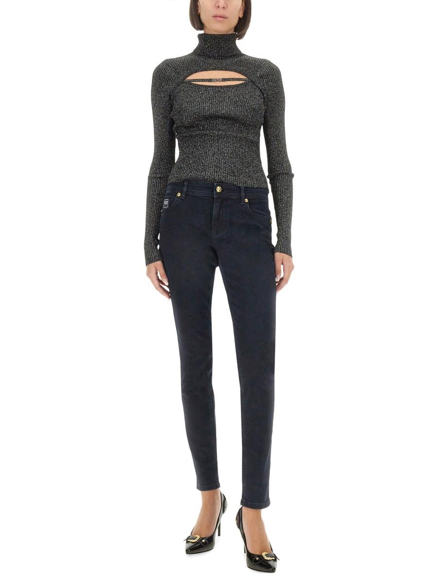 VERSACE JEANS COUTURE MAGLIA IN LUREX CON LOGO Fino al 65% di sconto